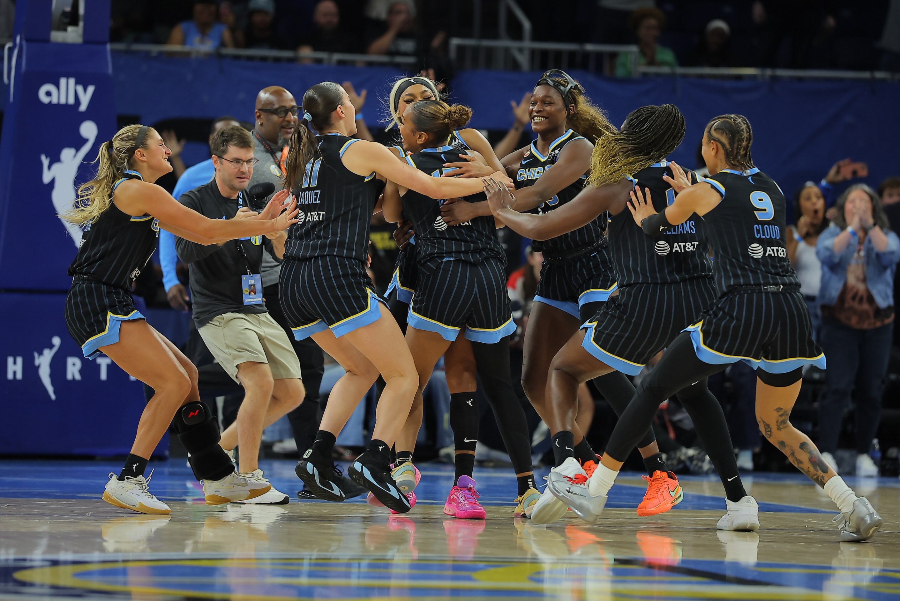 Sydney Taylor #12 of the Chicago Sky celebrates with her teammates after a game winning three-point basket during the second half against the Las Vegas Aces on August 1, 2026 at Wintrust Arena in Chicago, Illinois.