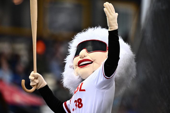 The WPBL mascot—a recreation of 99-year-old Maybelle Blair—performs during the third inning of the Women's Pro Baseball League Opening Day game between the Los Angeles Queens and the New York Heights at Robin Roberts Field on August 01, 2026 in Springfield, Illinois.