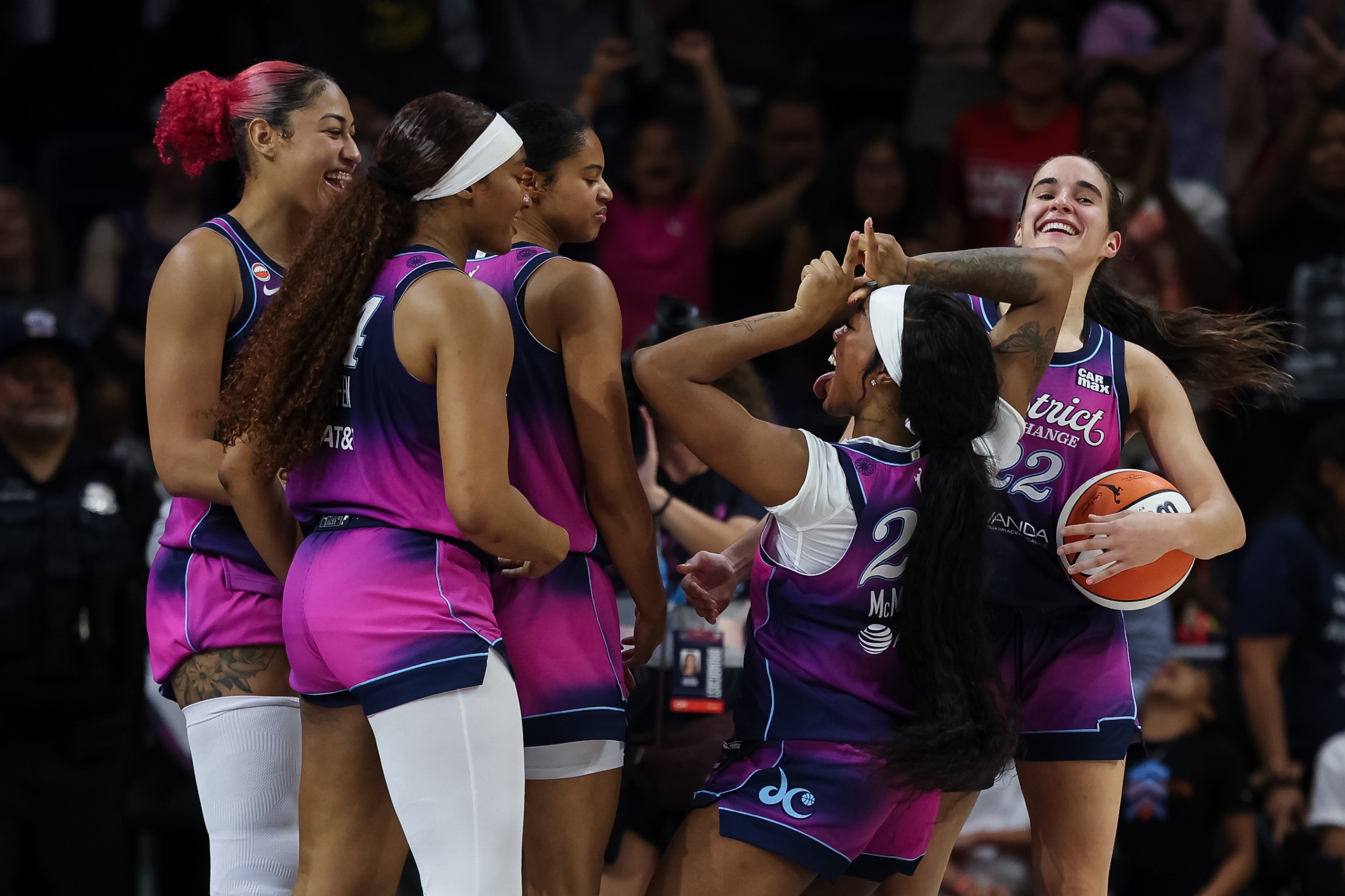 Cotie McMahon #23 of the Washington Mystics celebrates with teammates after the game against the Dallas Wings at CareFirst Arena on August 5, 2026 in Washington, DC.