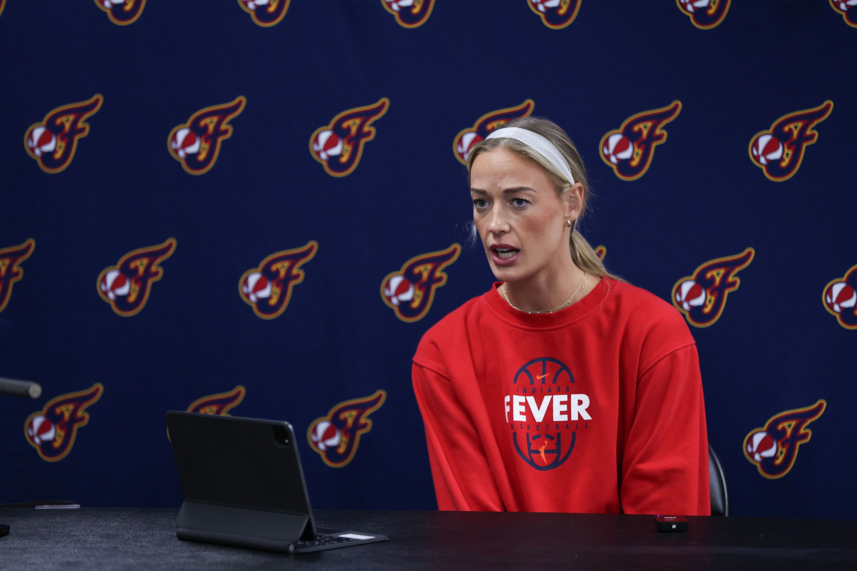 Sophie Cunningham #8 of the Indiana Fever speaks during a press conference before a game against the Portland Fire at Moda Center