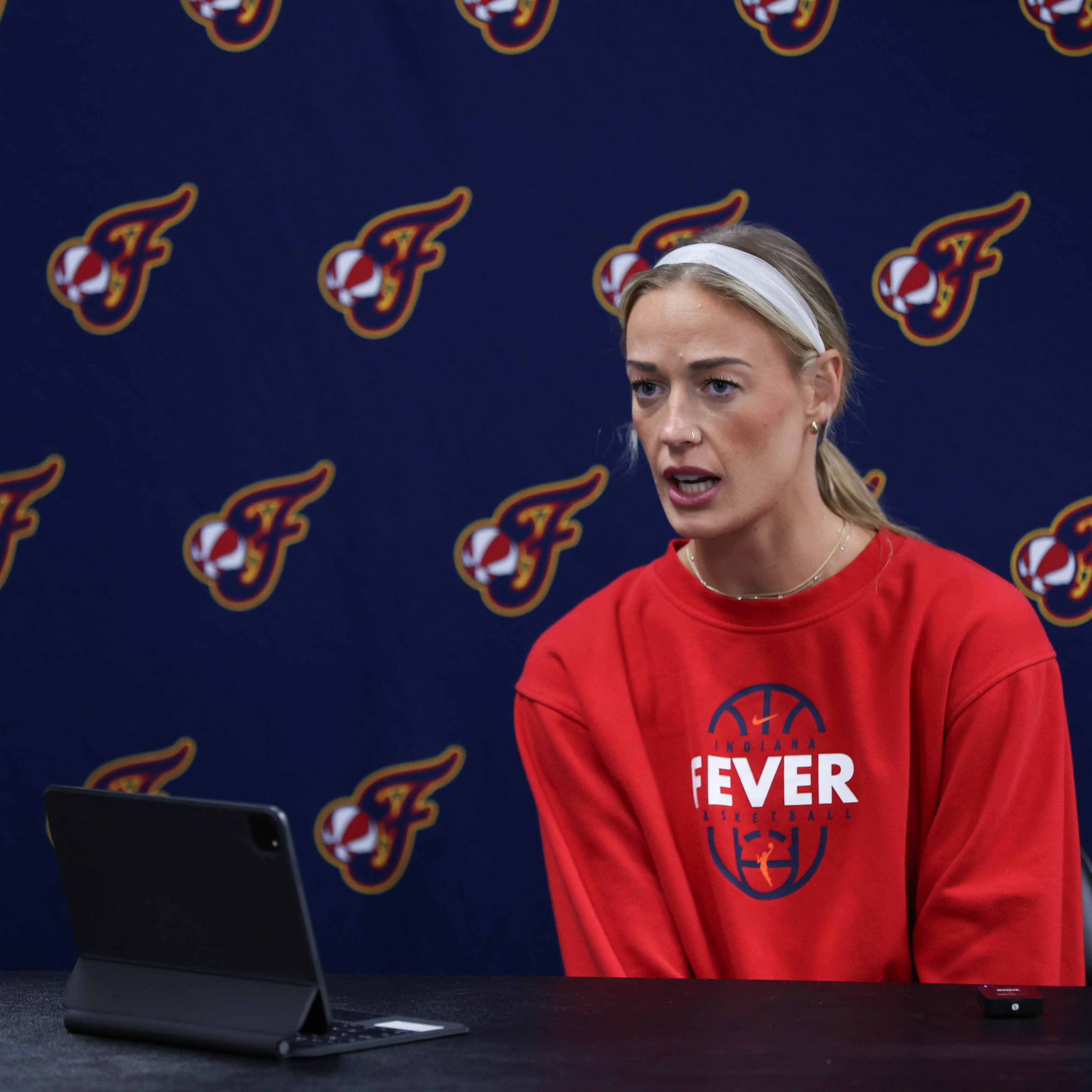 Sophie Cunningham #8 of the Indiana Fever speaks during a press conference before a game against the Portland Fire at Moda Center