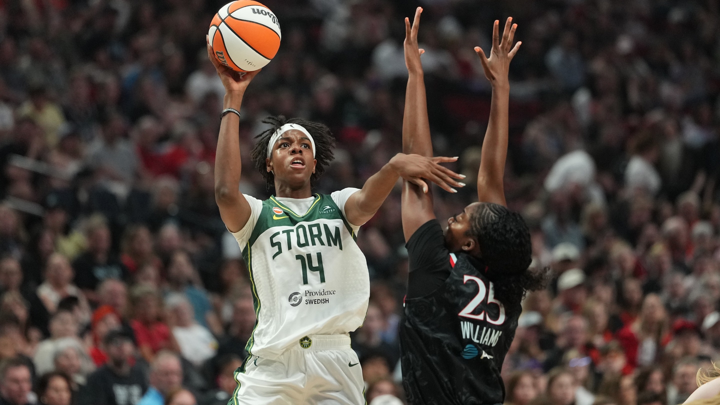 Dominique Malonga #14 of the Seattle Storm shoots against Serah Williams #25 of the Portland Fire during the first half at Moda Center on August 08, 2026 in Portland, Oregon.