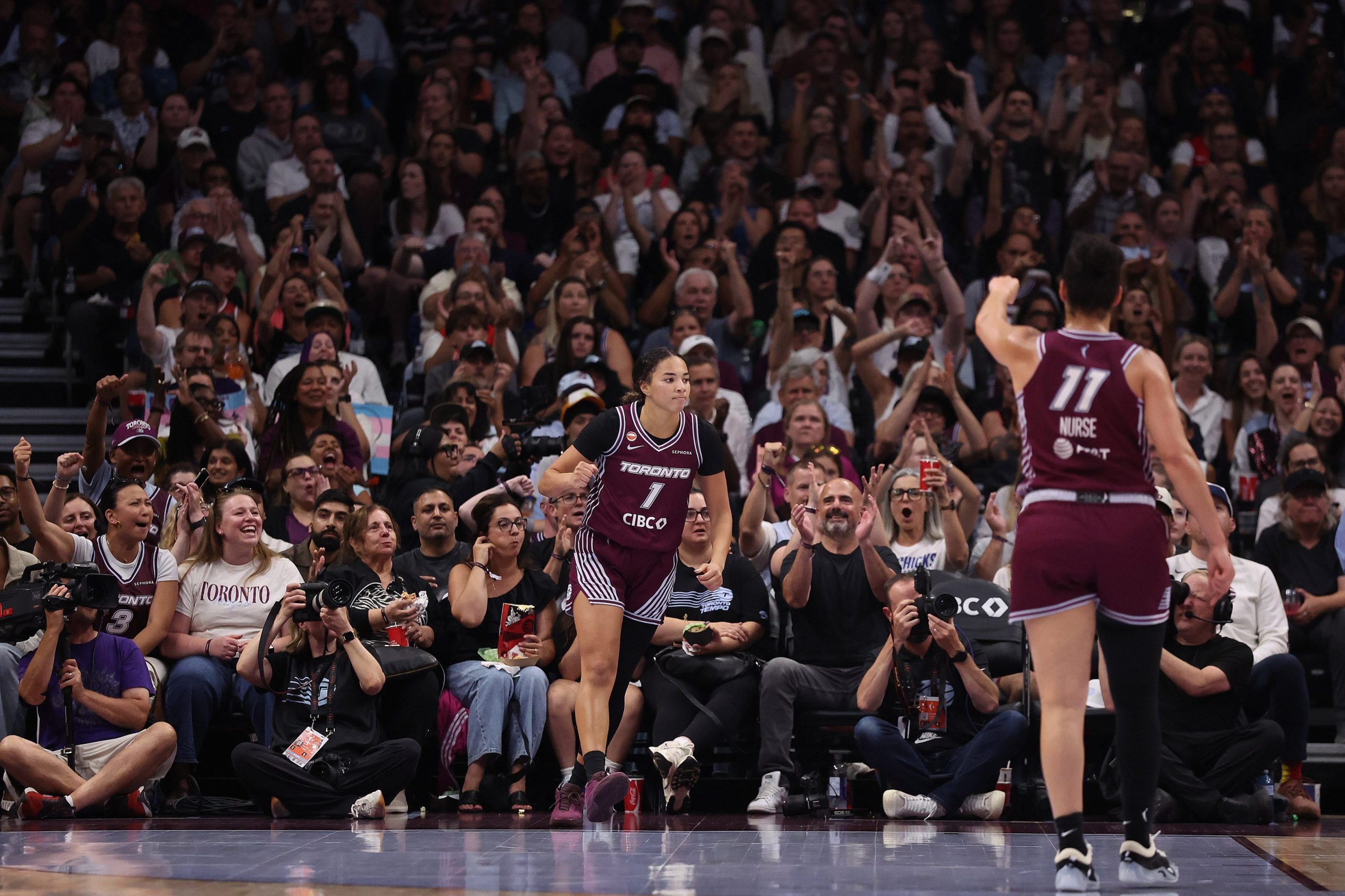 Kiki Rice #1 of the Toronto Tempo celebrates a basket as the Toronto Tempo play the Indiana Fever at ScotiaBank Arena in Toronto. August 18, 2026.