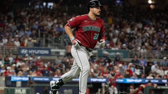 Nolan Arenado #28 of the Arizona Diamondbacks jogs to first base after hitting a solo home run in the seventh inning of a game against the Atlanta Braves at Truist Park on August 15, 2026 in Atlanta, Georgia.