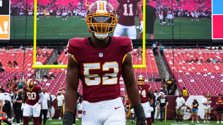 Sonny Styles #52 of the Washington Commanders warms up prior to the NFL preseason football game against the Miami Dolphins at Northwest Stadium on August 14, 2026 in Landover, Maryland.
