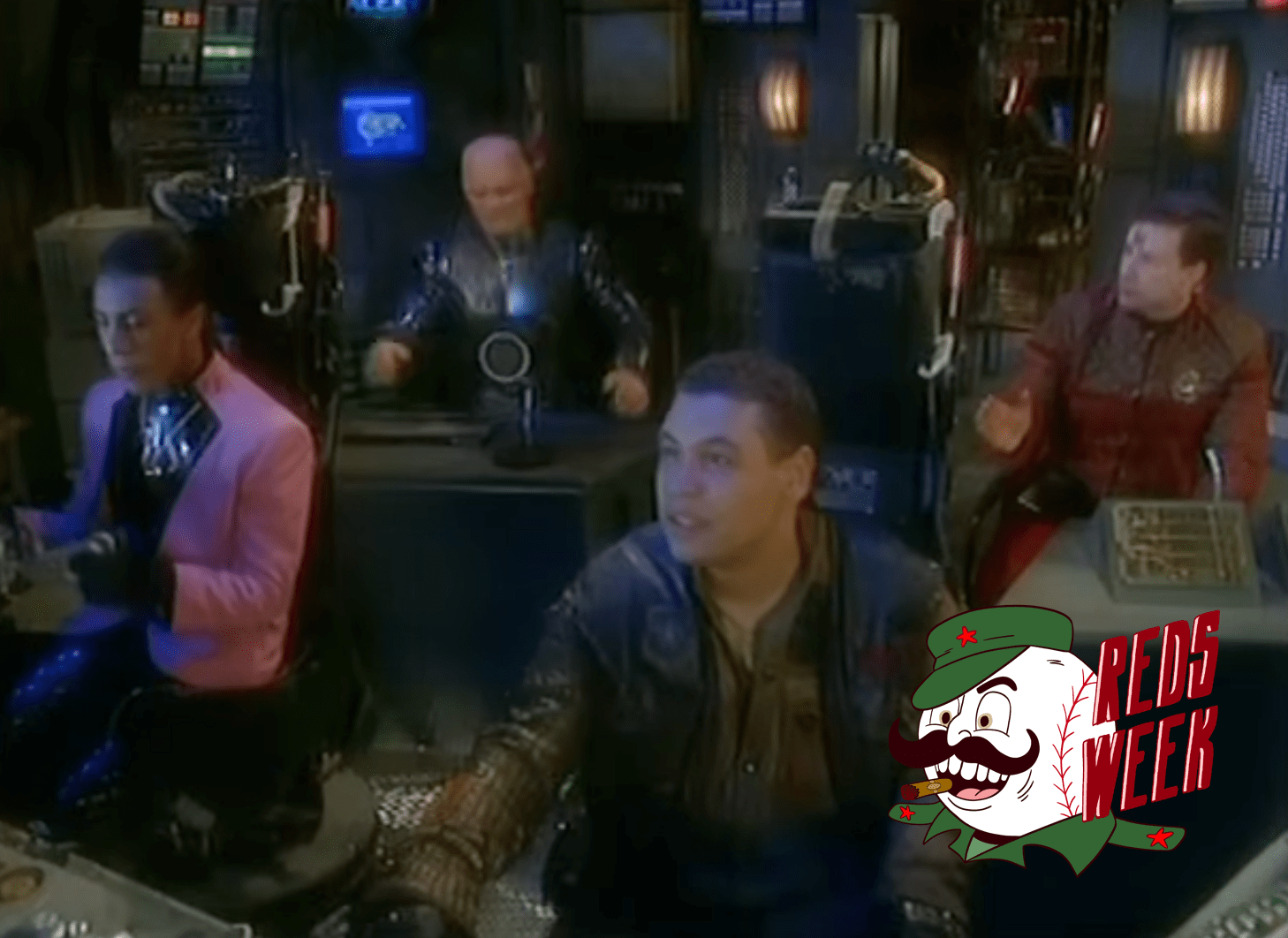 A screenshot of the Starbug's bridge from an episode of Red Dwarf, with the Reds Week logo at lower right.