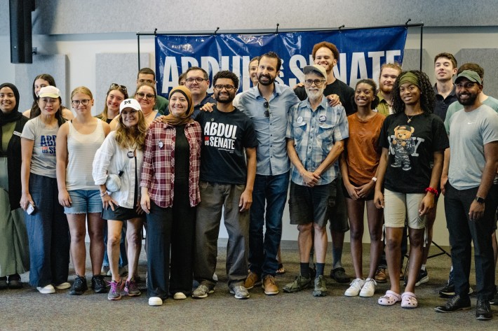 Canvassers pose for a photo