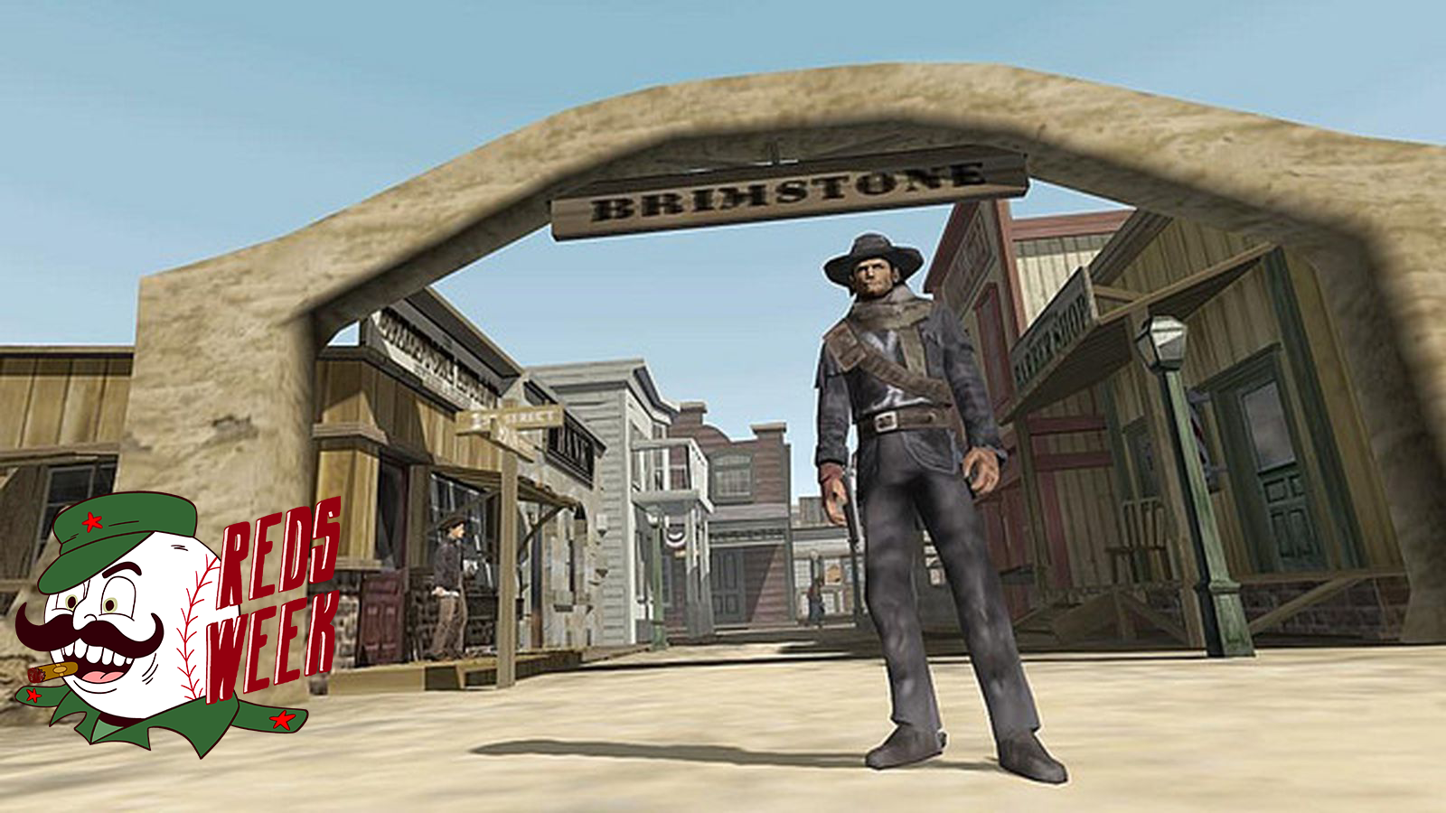 Red from Red Dead Revolver standing just outside of Brimstone, the main city in the game. The Reds Week logo is on the bottom left.