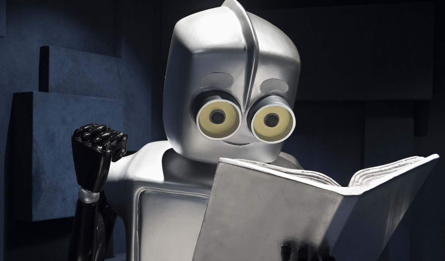 Studious robot on an ocean liner cruising the North Sea.