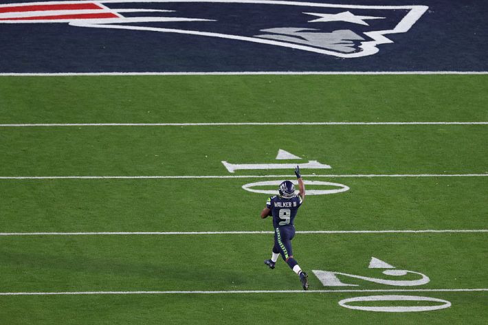 SANTA CLARA, CALIFORNIA - FEBRUARY 08: Kenneth Walker III #9 of the Seattle Seahawks runs for a touchdown that was called back during the fourth quarter against the New England Patriots in Super Bowl LX at Levi's Stadium on February 08, 2026 in Santa Clara, California.