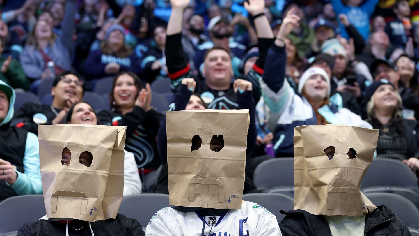SEATTLE, WASHINGTON - FEBRUARY 28: Vancouver Canucks fans look on during the third period against the Seattle Kraken at Climate Pledge Arena on February 28, 2026 in Seattle, Washington.