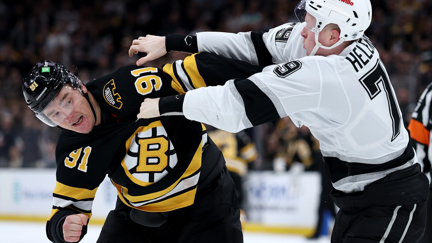 BOSTON, MASSACHUSETTS - MARCH 10: Samuel Helenius #79 of the Los Angeles Kings and Nikita Zadorov #91 of the Boston Bruins fight during the second period at TD Garden on March 10, 2026 in Boston, Massachusetts.