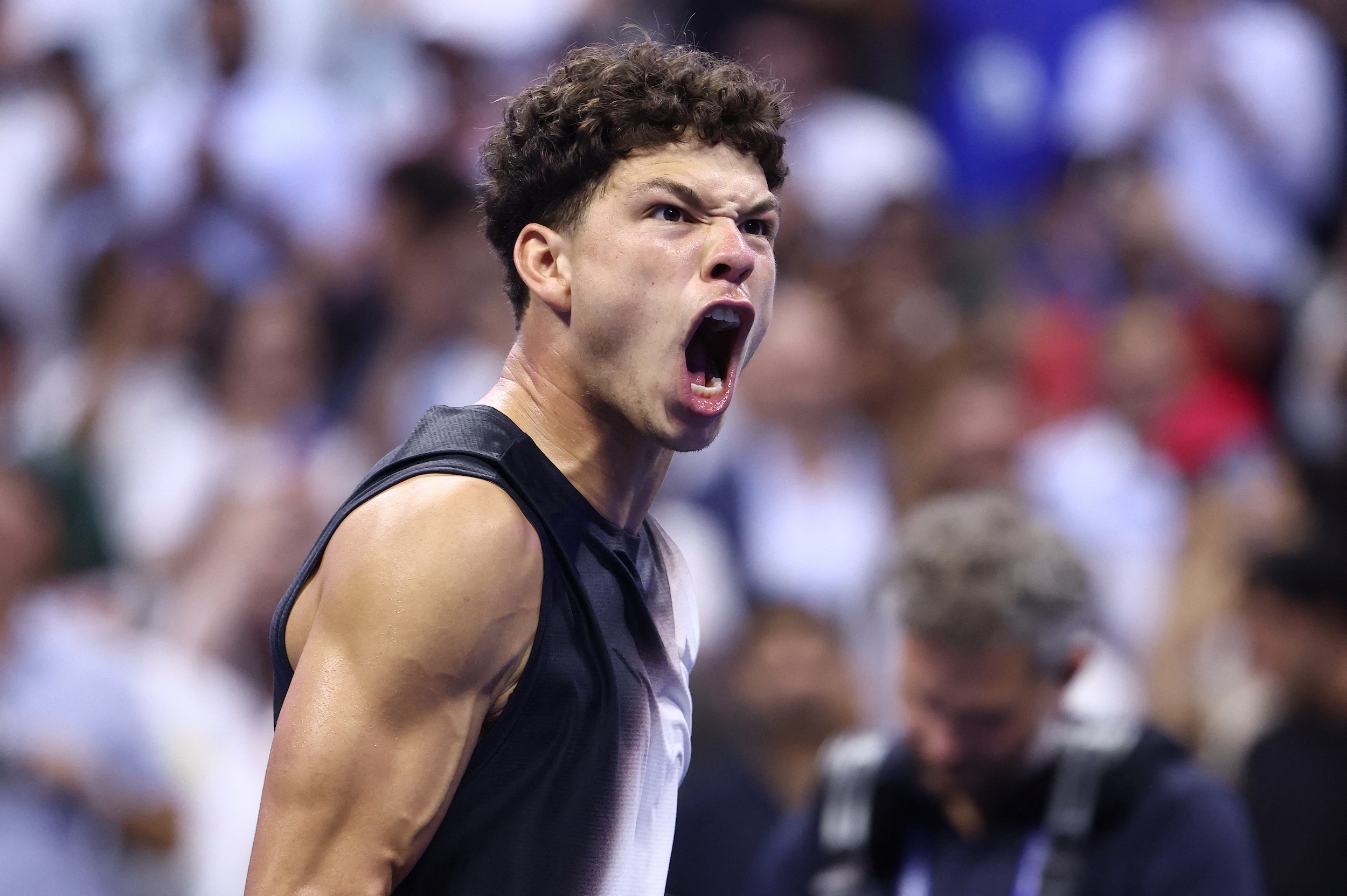 USA's Ben Shelton celebrates his win against Spain's Carlos Alcaraz during the men's singles quarter-final tennis match on day ten of the US Open tennis tournament at the USTA Billie Jean King National Tennis Center in New York City on September 9, 2026. (Photo by Leonardo MUNOZ / AFP) / “The erroneous mention[s] appearing in the metadata of this photo by Leonardo MUNOZ has been modified in AFP systems in the following manner: [USA's Ben Shelton] instead of [Spain's Carlos Alcaraz]. Please immediately remove the erroneous mention[s] from all your online services and delete it (them) from your servers. If you have been authorized by AFP to distribute it (them) to third parties, please ensure that the same actions are carried out by them. Failure to promptly comply with these instructions will entail liability on your part for any continued or post notification usage. Therefore we thank you very much for all your attention and prompt action. We are sorry for the inconvenience this notification may cause and remain at your disposal for any further information you may require.”