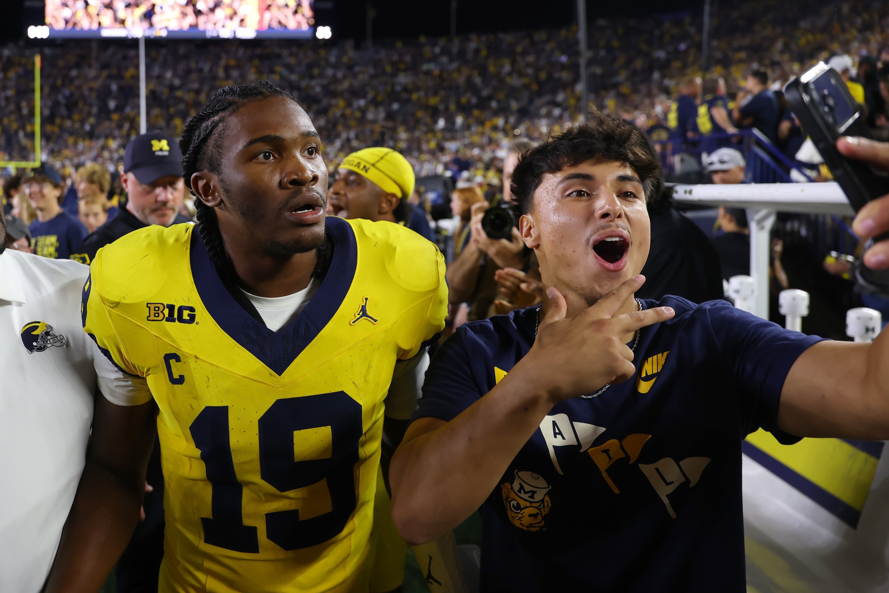 Bryce Underwood of the Michigan Wolverines celebrates after a 13-12 win over the Western Michigan Broncos at Michigan Stadium on September 05, 2026 in Ann Arbor, Michigan.