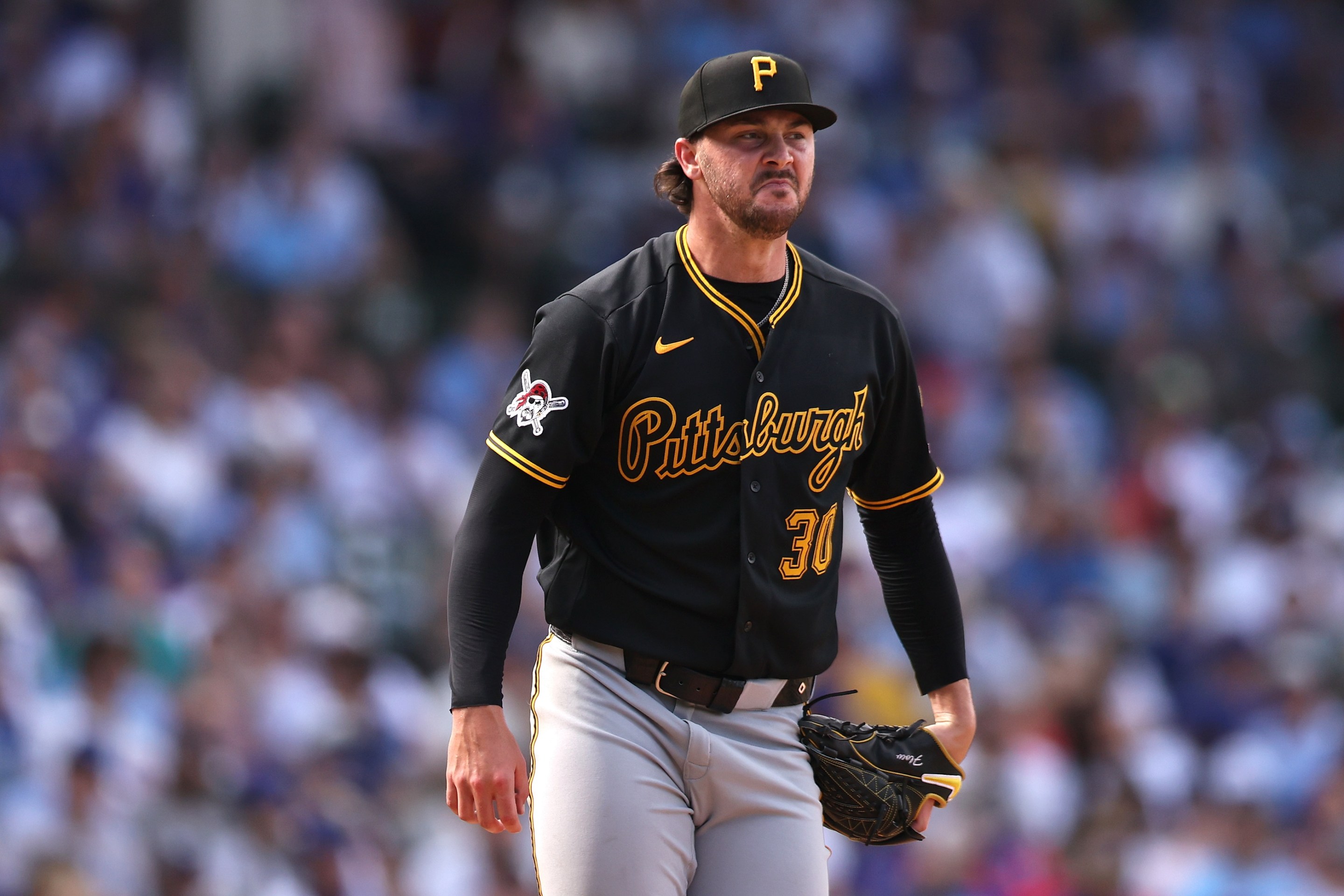 Paul Skenes of the Pittsburgh Pirates looks on during the seventh inning against the Chicago Cubs at Wrigley Field on September 12, 2026 in Chicago, Illinois. He is making a very pouty face.