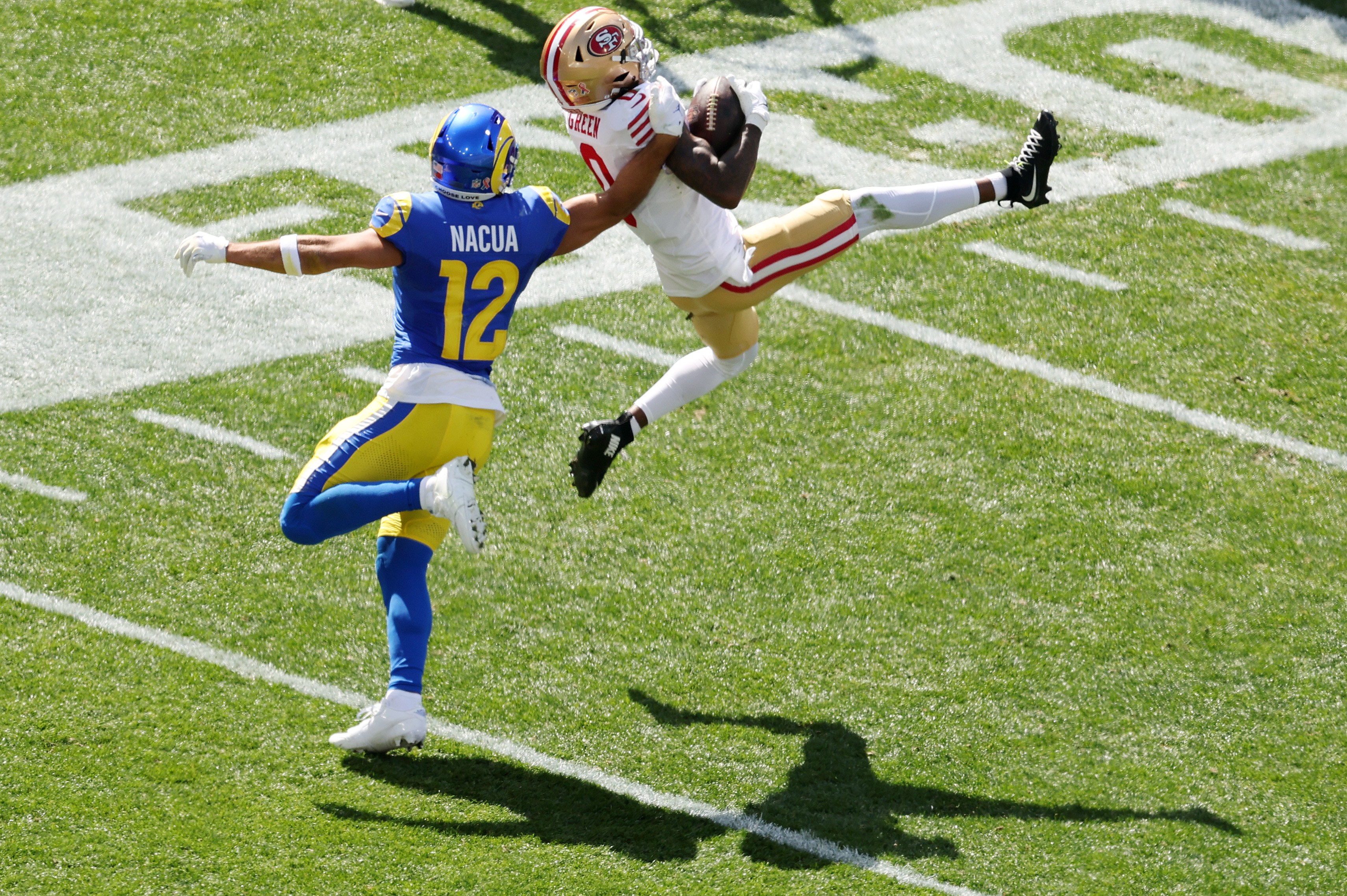 Renardo Green #0 of the San Francisco 49ers catches the ball during the NFL football game at the Melbourne Cricket Ground on September 11, 2026.