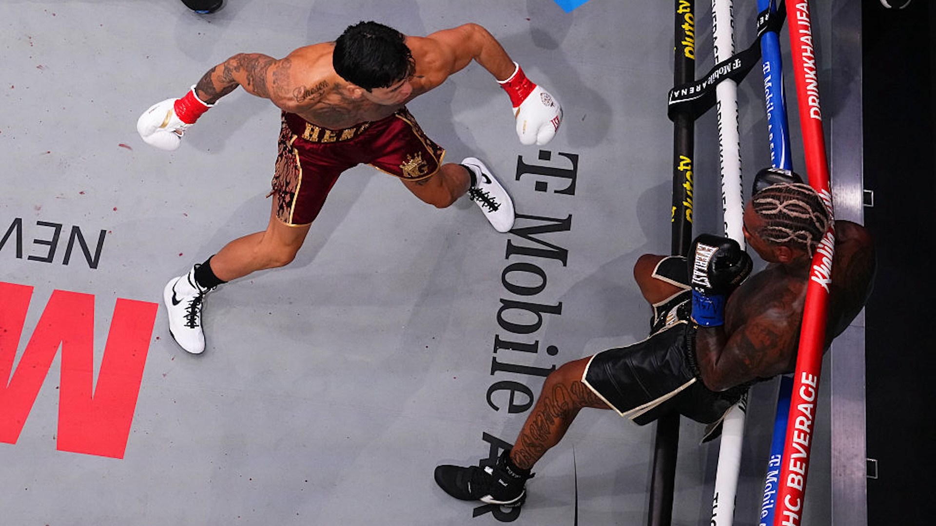 Ryan Garcia punches Conor Benn while Benn is on the ropes