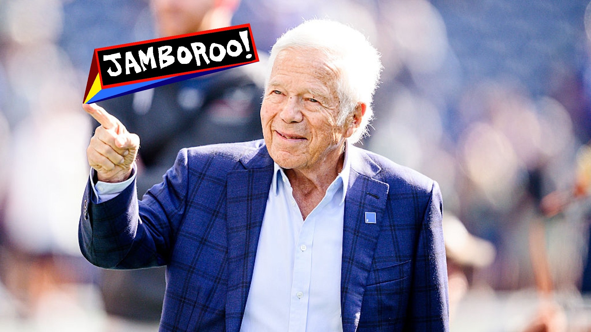 Robert Kraft pointing at something