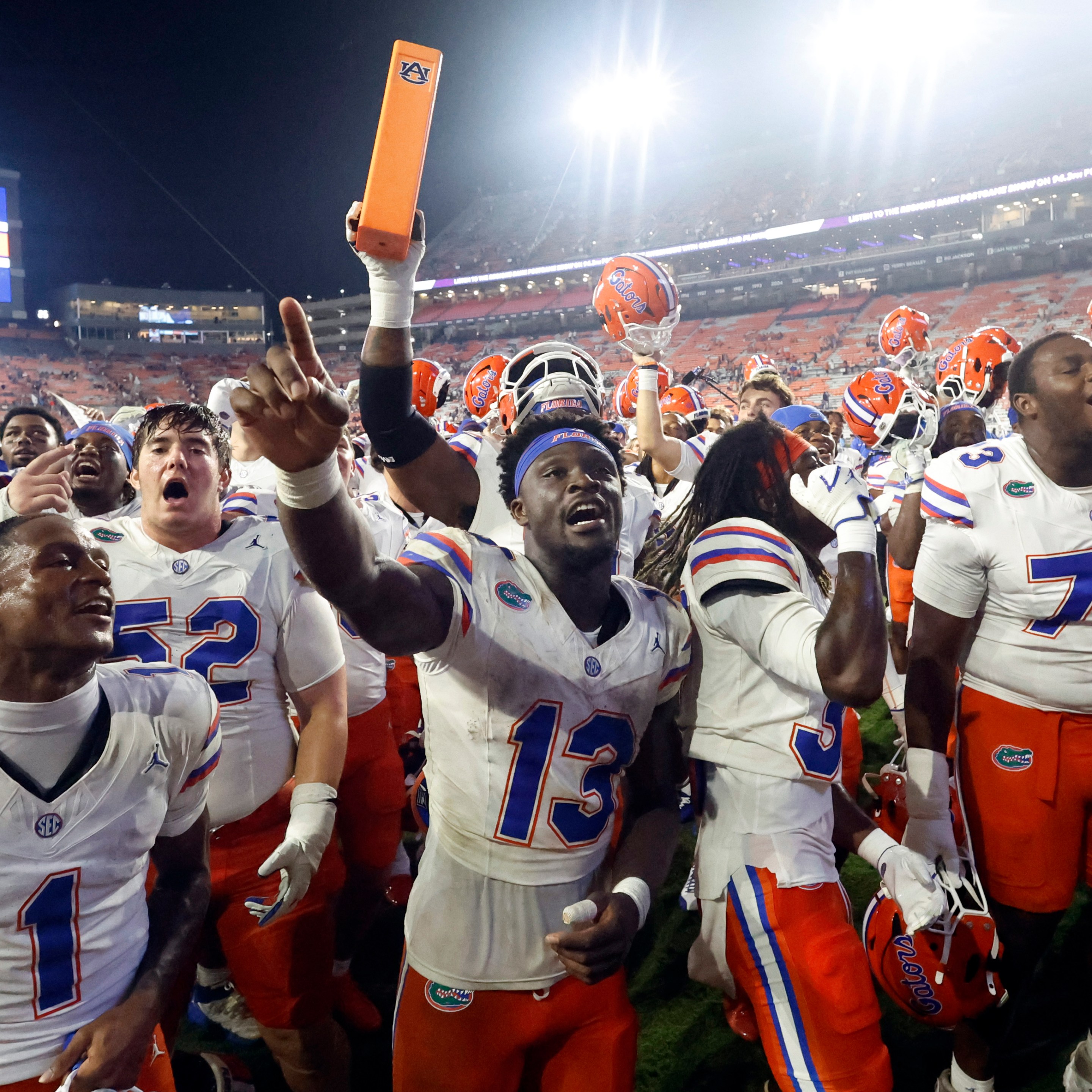 AUBURN, ALABAMA - SEPTEMBER 19:  Running back Jadan Baugh #13 of the Florida Gators celebrates with team after a win over the Auburn Tigers at Jordan Hare stadium on September 19, 2026 in Auburn, Alabama.
