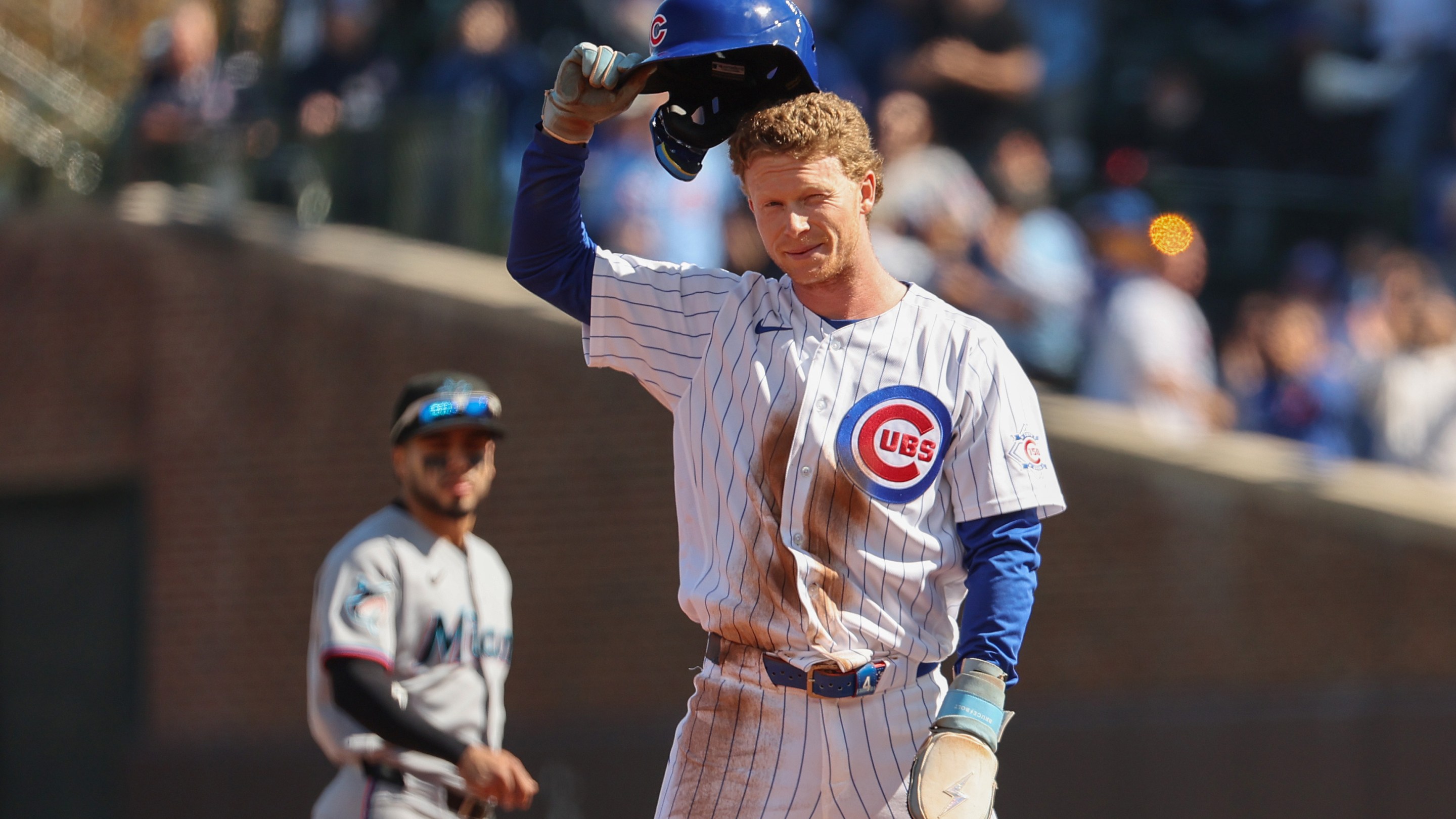 Pete Crow-Armstrong #4 of the Chicago Cubs tips his hat to the crowd after stealing his 40th stolen base during the first inning against the Miami Marlins at Wrigley Field on September 24, 2026.