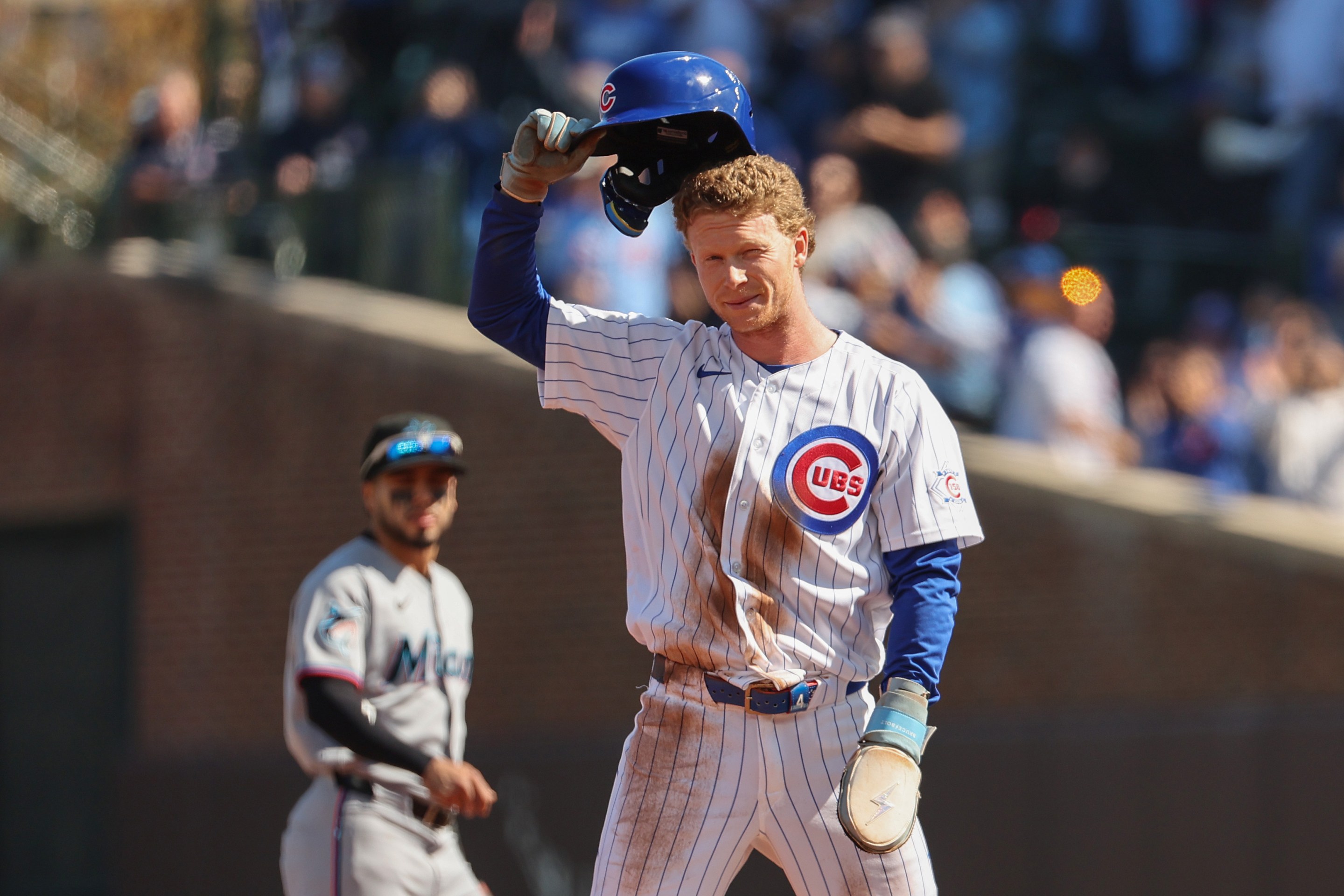 Pete Crow-Armstrong #4 of the Chicago Cubs tips his hat to the crowd after stealing his 40th stolen base during the first inning against the Miami Marlins at Wrigley Field on September 24, 2026.