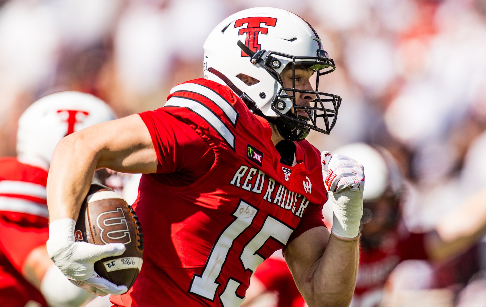 Austin Romaine #15 of the Texas Tech Red Raiders returns an interception for a touchdown during the first half of the game against the Sam Houston Bearkats at Galaxy Stadium on September 26, 2026 in Lubbock, Texas.