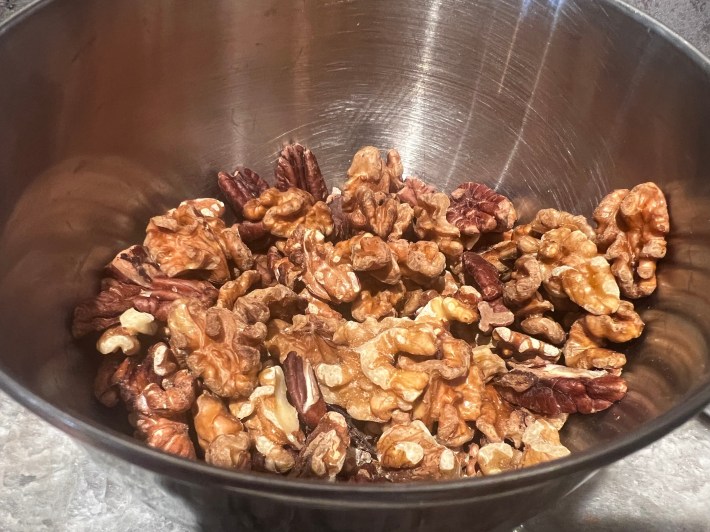Pecans and walnuts in a bowl.