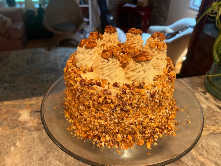 The finished cake, on a cake stand.