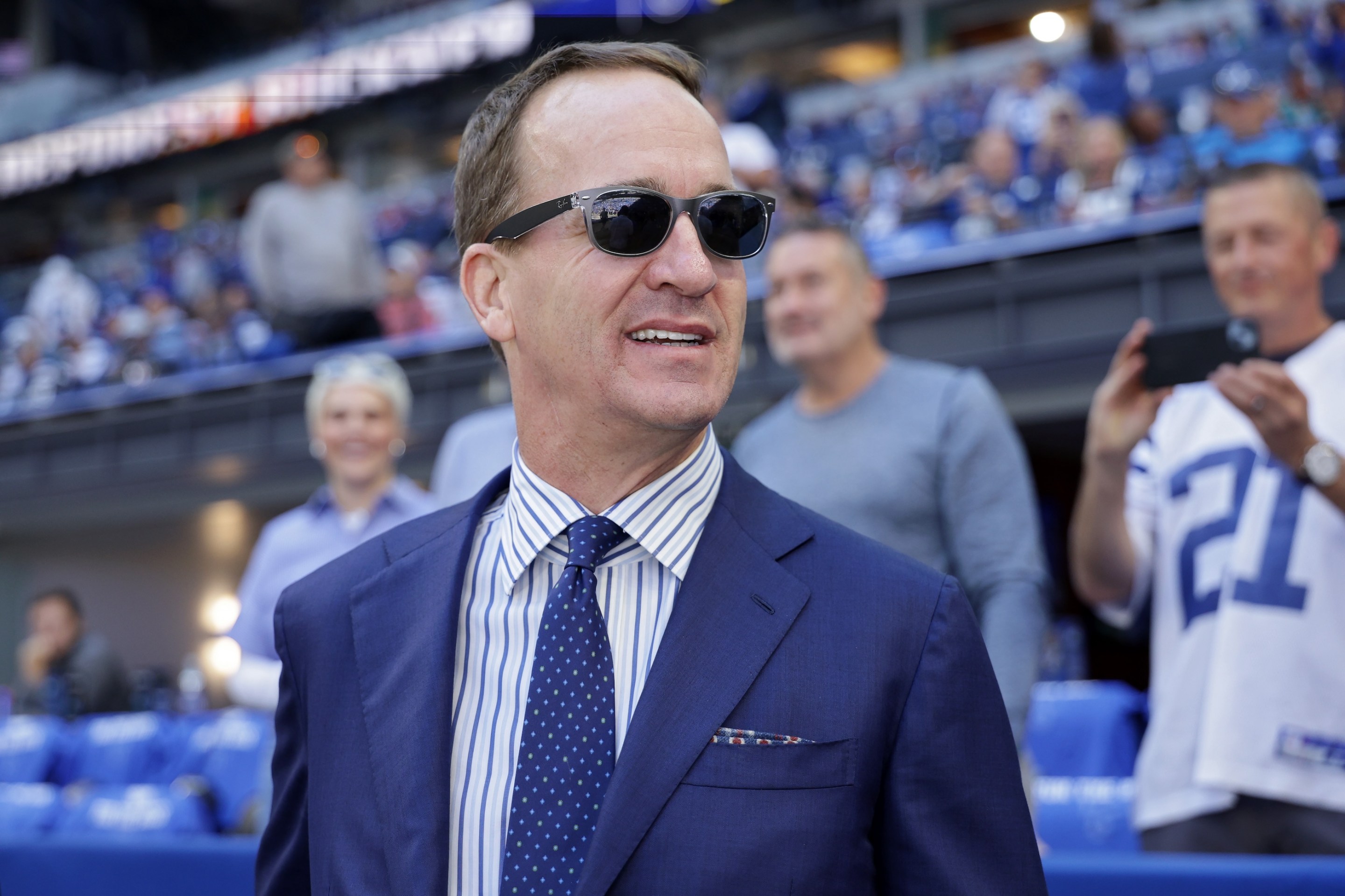 Former Indianapolis Colts player Peyton Manning looks on prior to the game between the Miami Dolphins and the Indianapolis Colts during the game on September 7, 2026. He kind of looks like Tom Wambsgans.