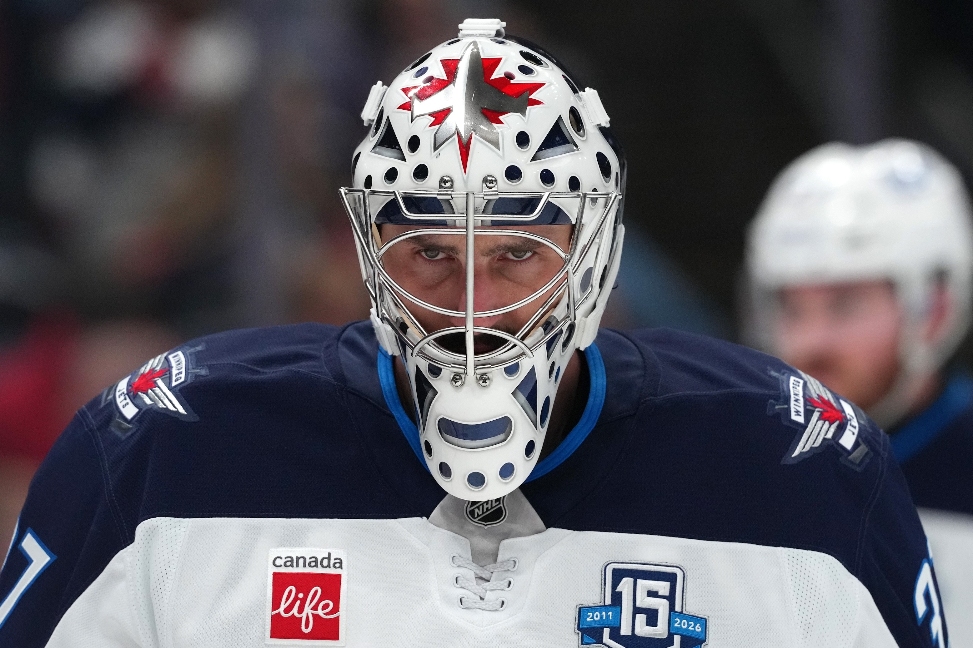 Detailed look at the mask worn by Connor Hellebuyck #37 of the Winnipeg Jets during the game against the Columbus Blue Jackets April 4, 2026.