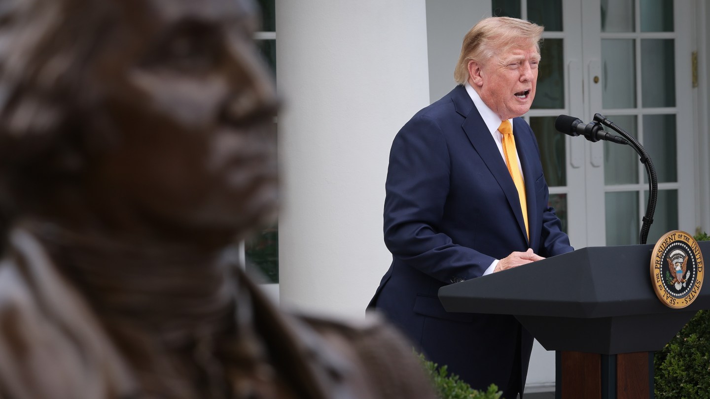 WASHINGTON, DC - AUGUST 24: U.S. President Donald Trump speaks during an event in the Rose Garden of the White House, next to a statue of George Washington, on August 24, 2026 in Washington, DC. The event focused on education and the Trump administration’s efforts on school choice, including a federal tax credit of up to $1,700 for contributions to nonprofits that award scholarships for education-related services. (Photo by Win McNamee/Getty Images)