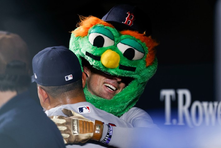 BALTIMORE, MD - SEPTEMBER 03: Nick Sogard #20 of the Boston Red Sox celebrates in a Wally the Green Monster mascot head after hitting a two-run home run in the eighth inning during the game between the Boston Red Sox and the Baltimore Orioles at Oriole Park at Camden Yards on Thursday, September 3, 2026 in Baltimore, Maryland. (Photo by Alyssa Piazza/MLB Photos via Getty Images)