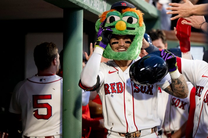 BOSTON, MASSACHUSETTS - AUGUST 31: Jarren Duran #16 of the Boston Red Sox reacts wearing the Wally Home Run Head in the dugout after hitting a two-run home run during the second inning of a game against the Seattle Mariners  August 31, 2026 at Fenway Park in Boston, Massachusetts. (Photo by Maddie Malhotra/Boston Red Sox/Getty Images)