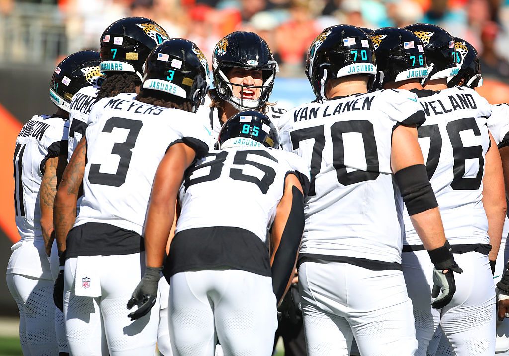 The Jaguars offense in a huddle