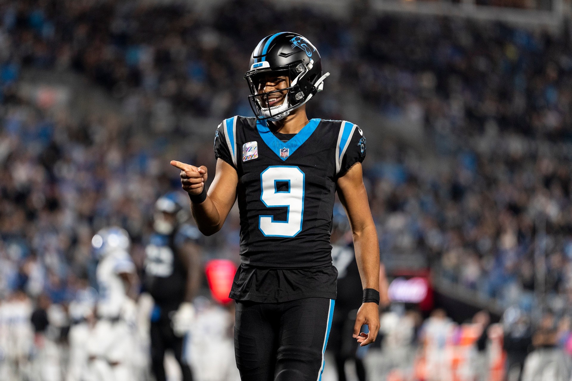 Bryce Young #9 of the Carolina Panthers celebrates after a touchdown against the Detroit Lions during an NFL football game at Bank of America Stadium on October 4, 2026 in Charlotte, North Carolina.