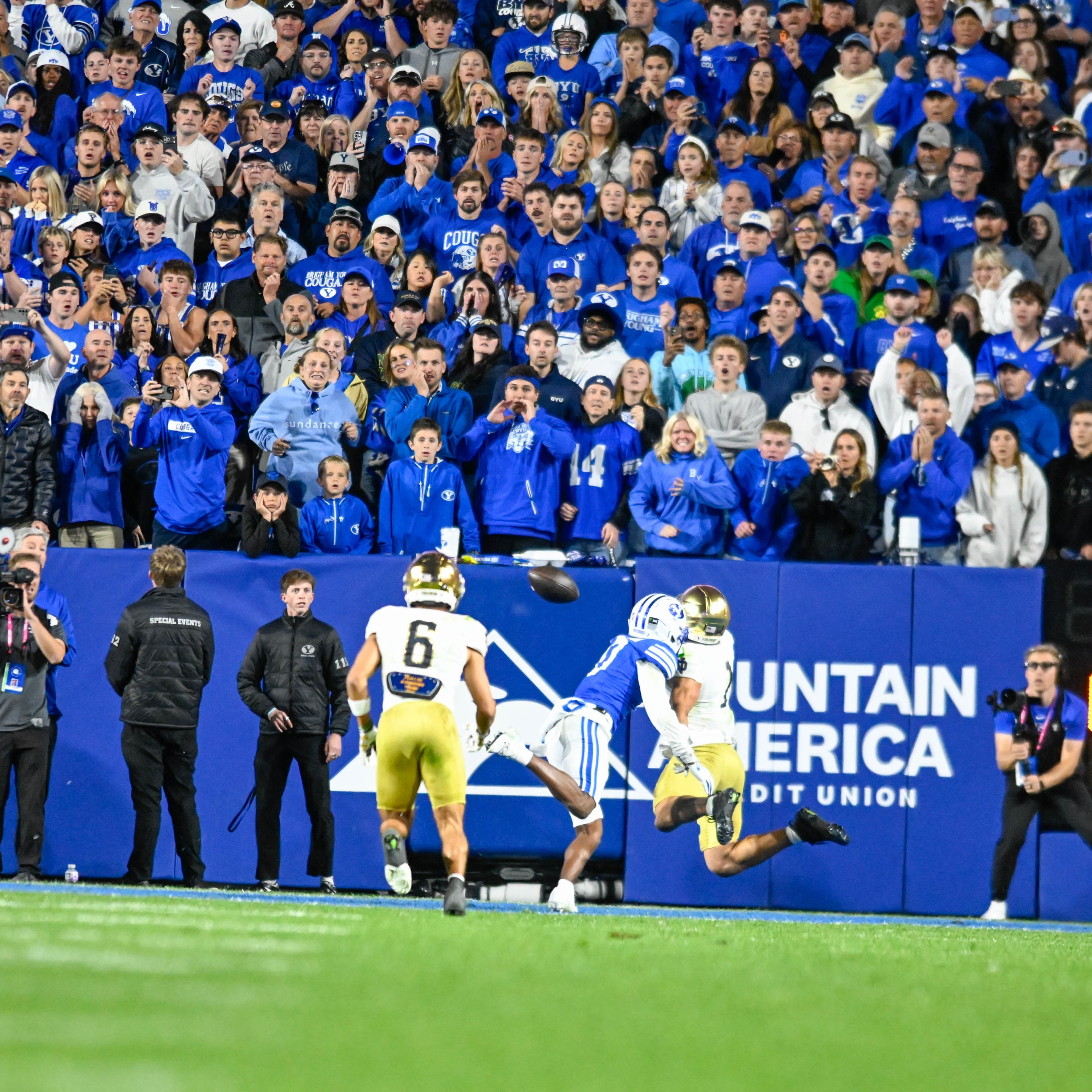 BYU fans watch with anticipation on the last play of the game to see an incomplete pass from Notre Dame