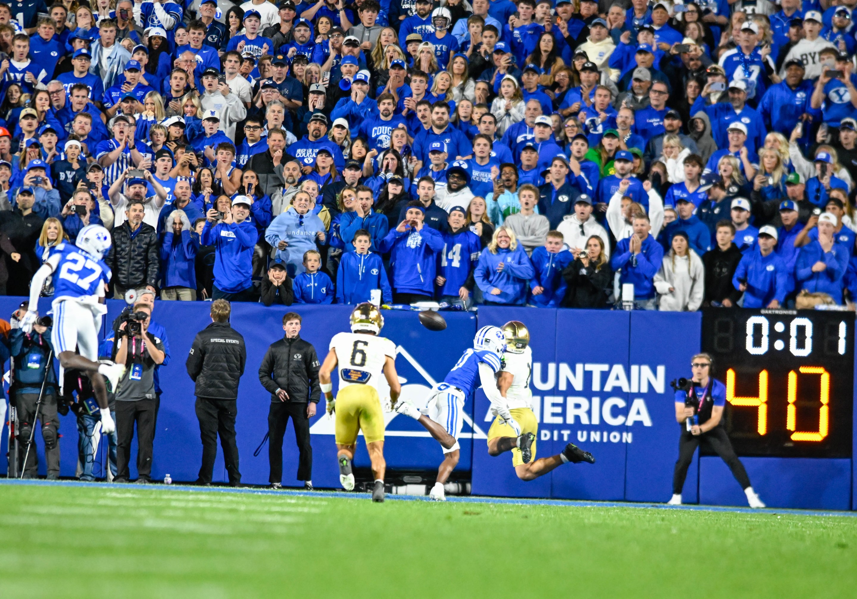 BYU fans watch with anticipation on the last play of the game to see an incomplete pass from Notre Dame