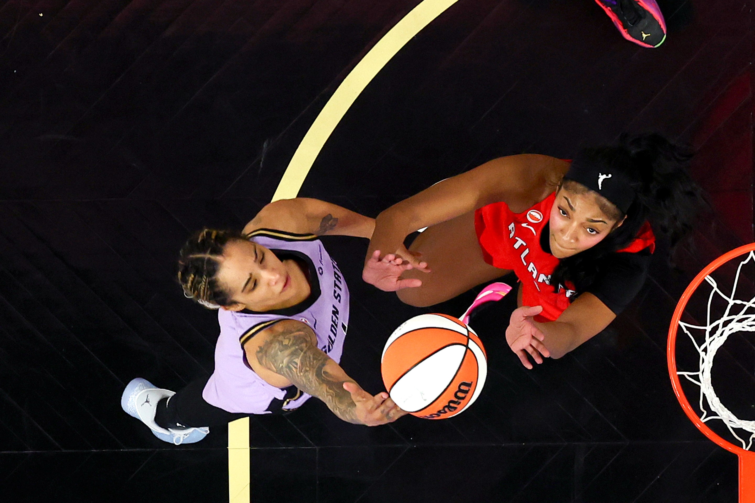 Gabby Williams #1 of the Golden State Valkyries attempts a lay up against Angel Reese #5 of the Atlanta Dream during the second quarter in game one of the WNBA Finals at Chase Center on October 17, 2026 in San Francisco, California.