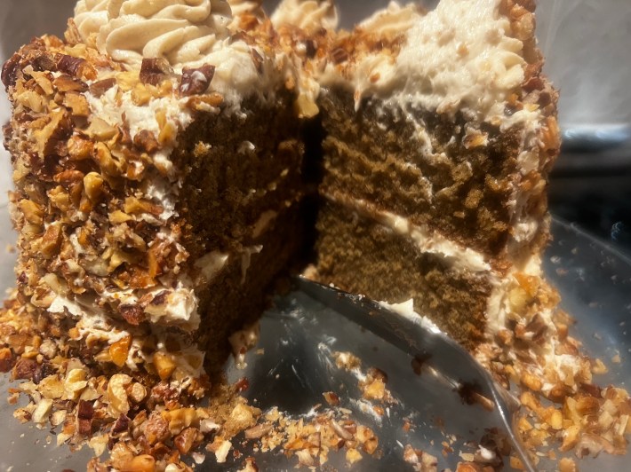 A somewhat unpleasant photo of the inside of the cake, where the sponge is very dark.