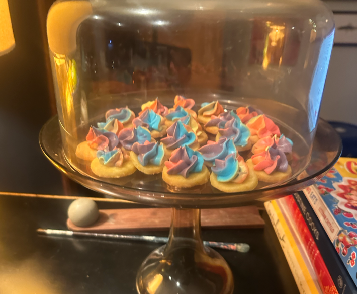 Cookies in a glass display.