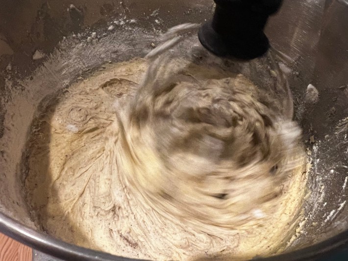 Batter is mixed in a stand mixer.