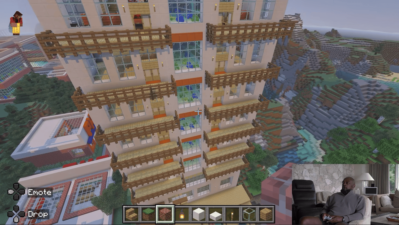 Mike Tomlin shows off his Minecraft city, specifically a residential building with an aquarium centerpiece on each floor.