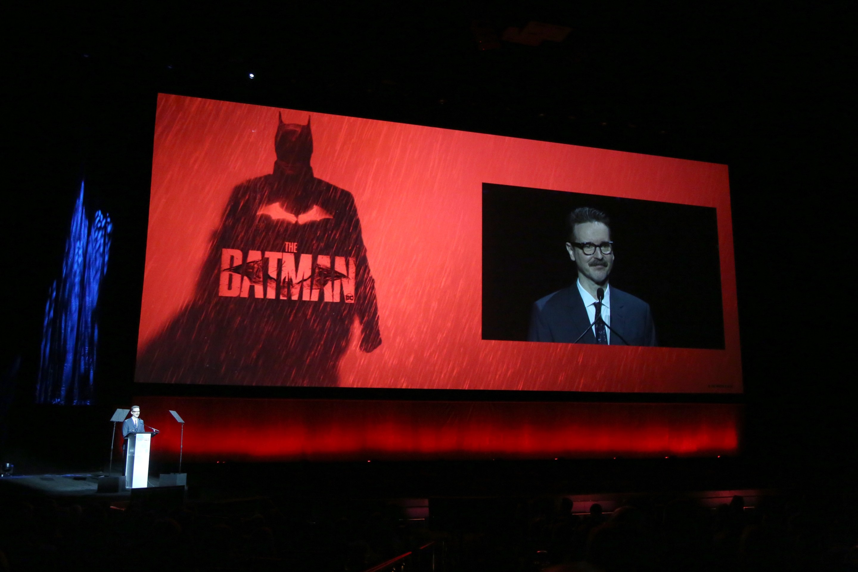 Director Matt Reeves speaks with the logo from his movie "The Batman" in the background during the “The State of the Industry” and Neon Studio presentation.